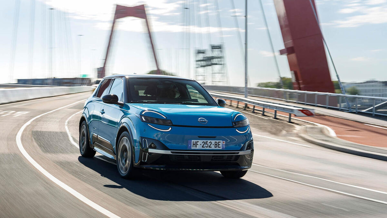 2025 Nissan Micra - driving over a bridge